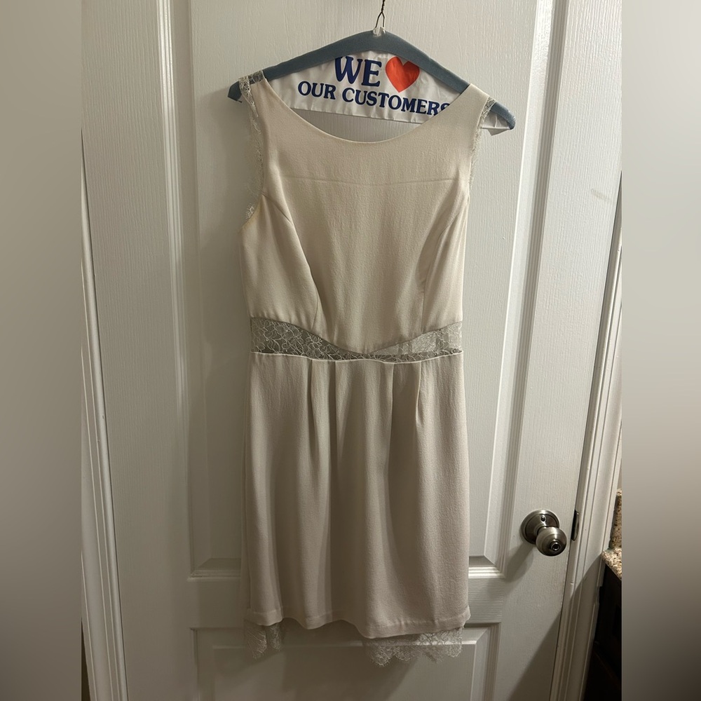 Sz 4, Cream lace BCBG Max Aria mini dress with lace back